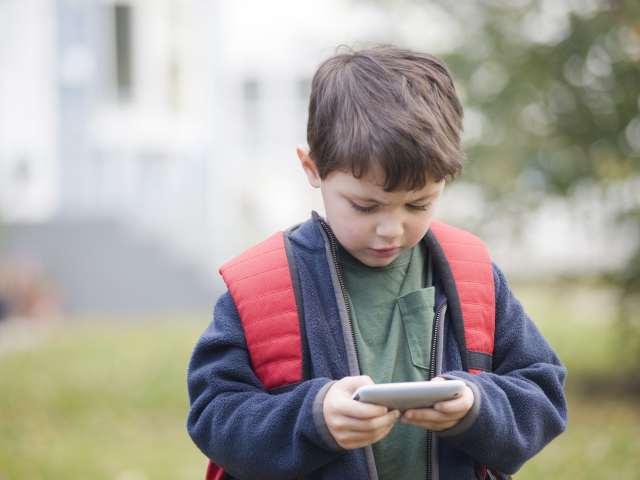 Kindergarten student with phone